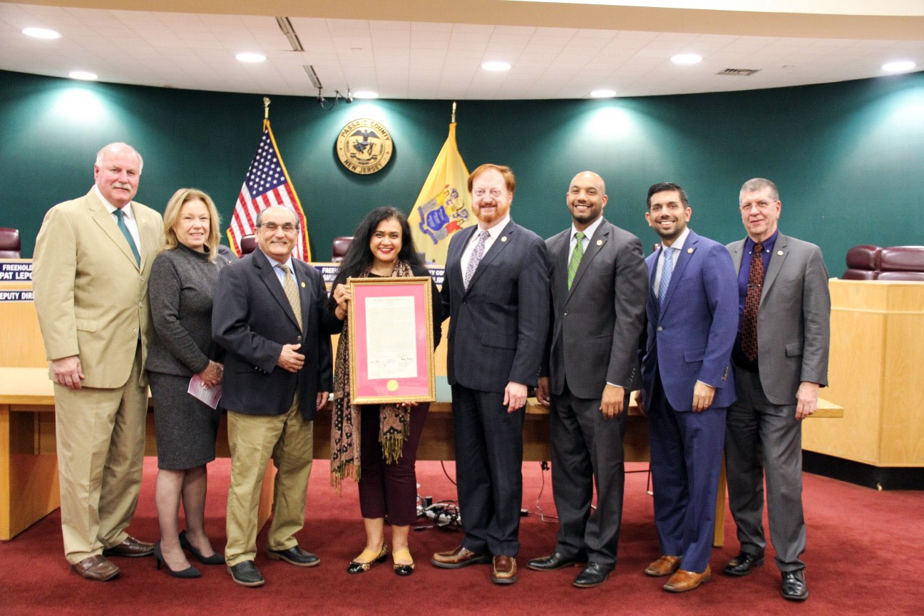Dr. Joshi with the Passaic County Freeholders upon receiving her 2020 Women's History Month Award.